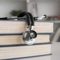 Stethoscope and books